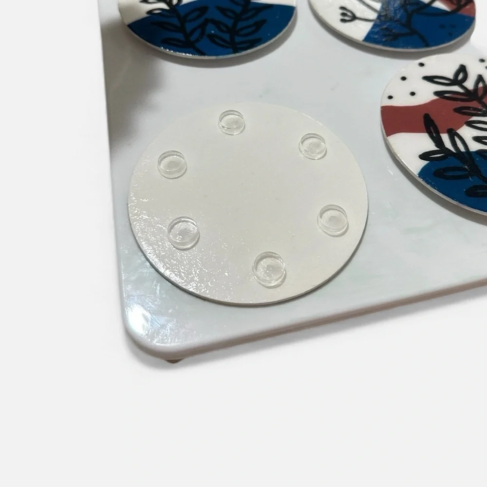 Handmade Drink Coasters With Floral Design and Blue and Brown Patterns